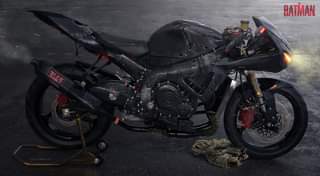 May be an image of motorcycle and text that says 'BATMAN'